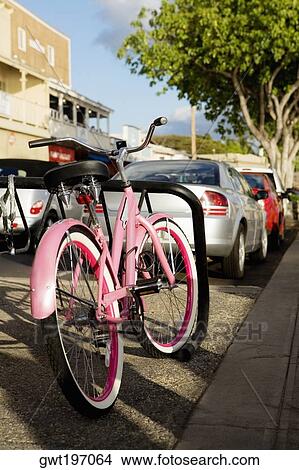Bicycle and cars parked at the roadside, Lahaina, Maui, Hawaii Islands, USA View Large Photo Image Picture - Bicycle and cars parked at the roadside, Lahaina, Maui, Hawaii Islands, USA. Fotosearch