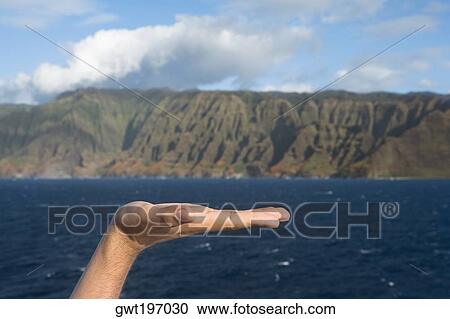 Close-up of a person's hand, Na Pali Coast State Park, Kauai, Hawaii Islands, USA View Large Photo Image Stock Image - Close-up of a person's hand, Na Pali Coast State Park, Kauai, Hawaii Islands, USA. Fotosearch