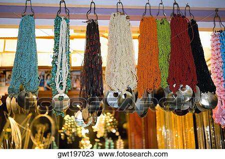 Necklaces displayed in a store View Large Photo Image Stock Image - Necklaces displayed in a store. Fotosearch