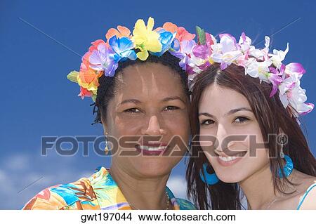 Portrait of a mature woman and a young woman smiling View Large Photo Image Picture - Portrait of a mature woman and a young woman smiling. Fotosearch