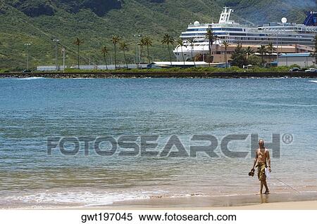 Tourists on the beach, Nawiliwili Beach Park, Kauai, Hawaii Islands, USA View Large Photo Image Stock Photography - Tourists on the beach, Nawiliwili Beach Park, Kauai, Hawaii Islands, USA. Fotosearch