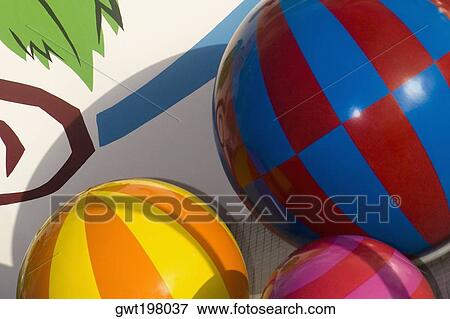 Close-up of a knob and balls on a multi-colored wall View Large Photo Image Stock Photo - Close-up of a knob and balls on a multi-colored wall. Fotosearch