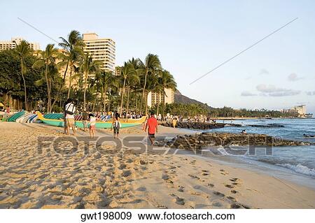 Stock Photo - Tourists on the beach, Waikiki Beach, Honolulu, Oahu, Hawaii Islands, USA. Fotosearch