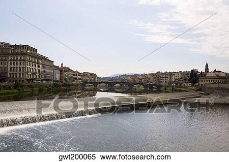 Arch bridge across a river, Arno River, Florence, Italy View Large Photo Image Stock Photography - Arch bridge across a river, Arno River, Florence, Italy. Fotosearch