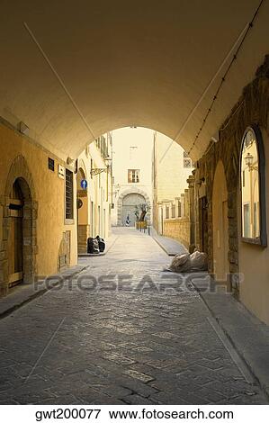 Stock Photo - Arched corridor of a house, Florence, Italy. Fotosearch