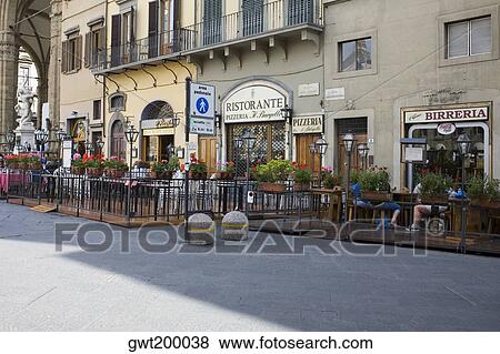 Group of people in a restaurant, Florence, Italy View Large Photo Image Stock Photo - Group of people in a restaurant, Florence, Italy. Fotosearch