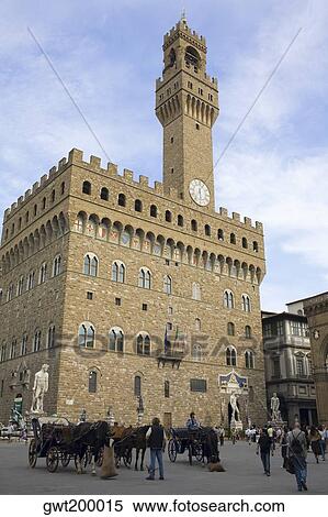 Horse carts in front of a palace, Pallazo Vecchio, Piazza Della Signoria, Florence, Italy View Large Photo Image Stock Photography - Horse carts in front of a palace, Pallazo Vecchio, Piazza Della Signoria, Florence, Italy. Fotosearch