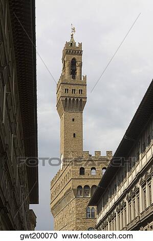 Low angle view of a clock tower, Pallazo Vecchio, Piazza Della Signoria, Florence, Italy View Large Photo Image Stock Image - Low angle view of a clock tower, Pallazo Vecchio, Piazza Della Signoria, Florence, Italy. Fotosearch