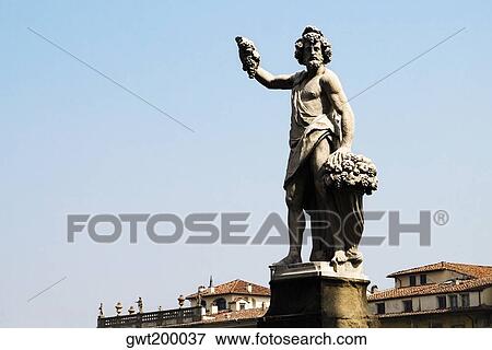 Low angle view of a statue, Ponte Santa Trinita Bridge, Florence, Tuscany, Italy View Large Photo Image Stock Photo - Low angle view of a statue, Ponte Santa Trinita Bridge, Florence, Tuscany, Italy. Fotosearch