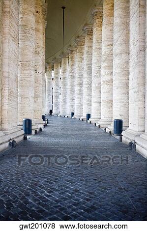 Stock Photo - Columns along a corridor of a building, Rome, Italy. Fotosearch