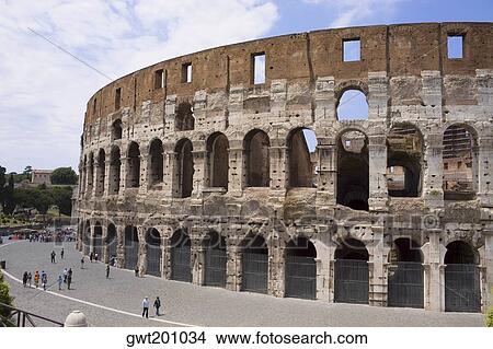 High angle view of a group of people in front of an amphitheater, Coliseum, Rome, Italy View Large Photo Image Picture - High angle view of a group of people in front of an amphitheater, Coliseum, Rome, Italy. Fotosearch