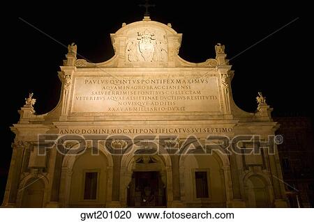 Stock Image - Low angle view of a church lit up at night, Fontana dell'Acqua Paola, Rome, Italy. Fotosearch