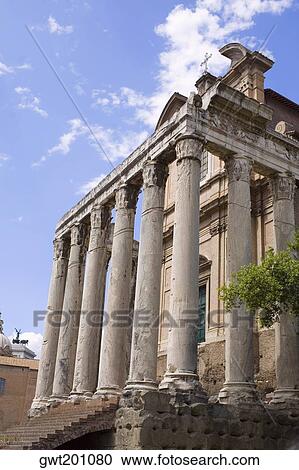 Low angle view of the old ruins of a temple, Faustina Temple, Rome, Italy View Large Photo Image Stock Image - Low angle view of the old ruins of a temple, Faustina Temple, Rome, Italy. Fotosearch