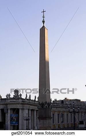 Picture - Obelisk in front of a church, St. Peter's Square, Vatican City. Fotosearch