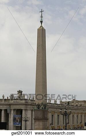 Stock Image - Obelisk in front of a church, St. Peter's Basilica, St. Peter's Square, Vatican City. Fotosearch