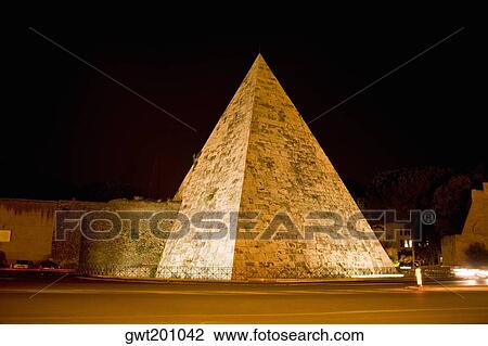 Pyramid lit up at night, Pyramid of Cestius, Rome, Italy View Large Photo Image Stock Image - Pyramid lit up at night, Pyramid of Cestius, Rome, Italy. Fotosearch