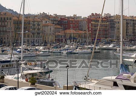Boats moored at a harbor, Nice, France View Large Photo Image Picture - Boats moored at a harbor, Nice, France. Fotosearch