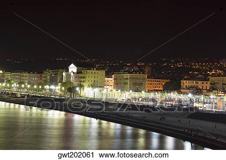 Buildings lit up at night, Nice, France View Large Photo Image Stock Image - Buildings lit up at night, Nice, France. Fotosearch