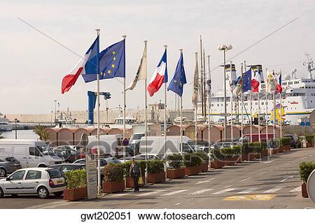 French and European Union Flags in a row at a harbor, Nice, France View Large Photo Image Stock Image - French and European Union Flags in a row at a harbor, Nice, France. Fotosearch