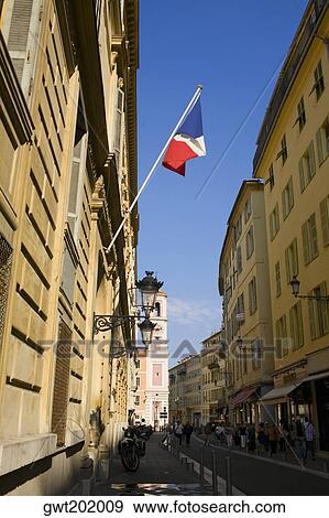 French flag on a building, Nice, France View Large Photo Image Stock Photo - French flag on a building, Nice, France. Fotosearch