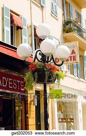Lamppost in front of a building, Nice, France View Large Photo Image Stock Image - Lamppost in front of a building, Nice, France. Fotosearch