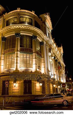 Low angle view of a building lit up at night, Nice, France View Large Photo Image Stock Photograph - Low angle view of a building lit up at night, Nice, France. Fotosearch