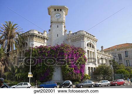Stock Image - Low angle view of a clock tower of a building, Nice, France. Fotosearch