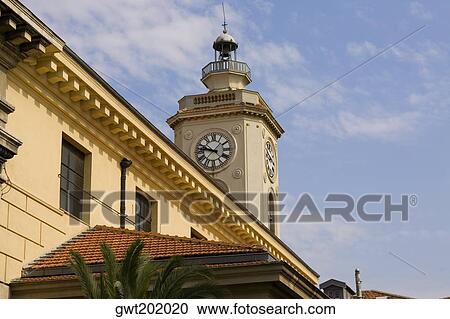 Low angle view of a clock tower of a building, Nice, France View Large Photo Image Stock Image - Low angle view of a clock tower of a building, Nice, France. Fotosearch