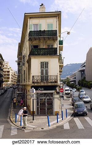 Roads passing along a cafe, Nice, France View Large Photo Image Stock Photo - Roads passing along a cafe, Nice, France. Fotosearch