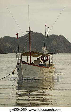 Boat anchored at the port, Taganga Port, Taganga Bay, Magdalena, Colombia View Large Photo Image Stock Photo - Boat anchored at the port, Taganga Port, Taganga Bay, Magdalena, Colombia. Fotosearch