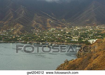 High angle view of a city, Taganga Bay, Taganga, Magdalena, Colombia View Large Photo Image Stock Image - High angle view of a city, Taganga Bay, Taganga, Magdalena, Colombia. Fotosearch
