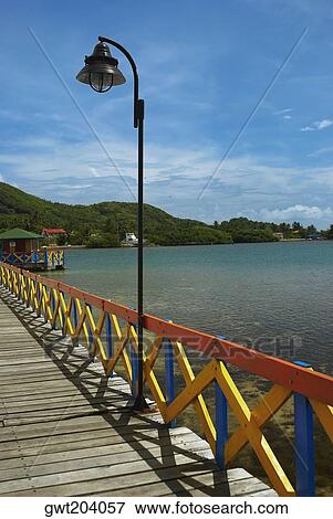 Stock Photo - Pier in the sea, Lovebird's Bridge, Providencia, Providencia y Santa Catalina, San Andres y Providencia Department, Colombia. Fotosearch