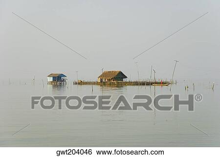 Two stilt houses in the river, Cienaga, Atlantico, Colombia View Large Photo Image Stock Photograph - Two stilt houses in the river, Cienaga, Atlantico, Colombia. Fotosearch