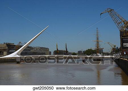 Stock Image - Bridge over the sea, Puente De La Mujer, Puerto Madero, Buenos Aires, Argentina. Fotosearch