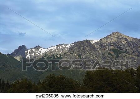 Clouds over a mountain range, San Carlos De Bariloche, Argentina View Large Photo Image Stock Photography - Clouds over a mountain range, San Carlos De Bariloche, Argentina. Fotosearch