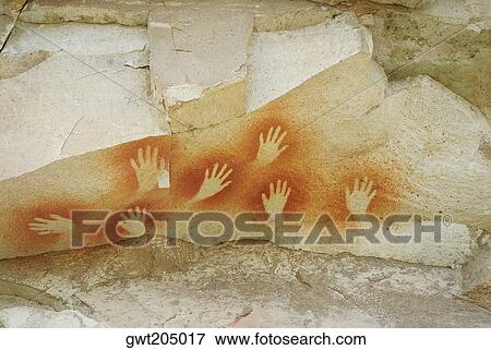 Hand signs on a rock, Cave of the Hands, Pinturas River, Patagonia, Argentina View Large Photo Image Stock Photo - Hand signs on a rock, Cave of the Hands, Pinturas River, Patagonia, Argentina. Fotosearch