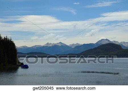 Stock Photography - Lake in front of mountains, Lake Nahuel Huapi, San Carlos De Bariloche, Argentina. Fotosearch