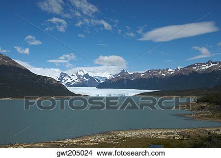 Picture - Lake passing through a mountain range, Moreno Glacier, Argentine Glaciers National Park, Lake Argentino, El Calafate, Patagonia, Argentina. Fotosearch