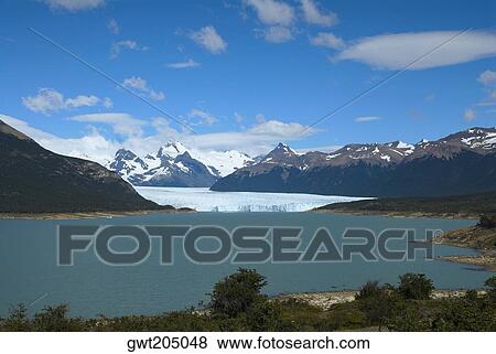 Lake passing through a mountain range, Moreno Glacier, Argentine Glaciers National Park, Lake Argentino, El Calafate, Patagonia, Argentina View Large Photo Image Stock Photo - Lake passing through a mountain range, Moreno Glacier, Argentine Glaciers National Park, Lake Argentino, El Calafate, Patagonia, Argentina. Fotosearch