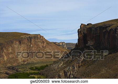 Rock formations on a landscape, Pinturas River, Patagonia, Argentina View Large Photo Image Stock Image - Rock formations on a landscape, Pinturas River, Patagonia, Argentina. Fotosearch