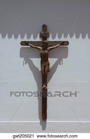 Stock Image - Statue of a Jesus Christ on a cross, Basilica De Nuestra Senora Del Pilar, Recoleta, Buenos Aires, Argentina. Fotosearch
