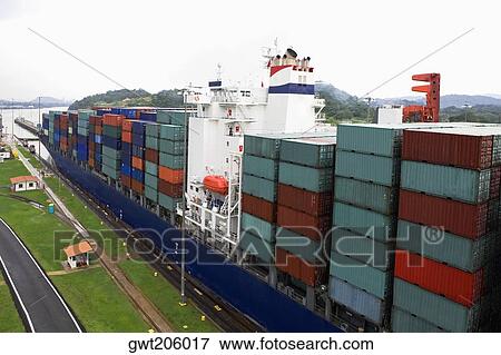 Cargo containers in a container ship at a commercial dock, Panama Canal, Panama View Large Photo Image Stock Photo - Cargo containers in a container ship at a commercial dock, Panama Canal, Panama. Fotosearch