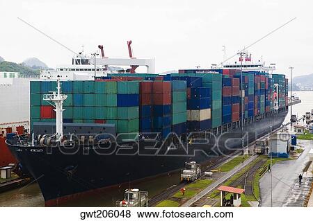Cargo containers in a container ship at a commercial dock, Panama Canal, Panama View Large Photo Image Stock Photo - Cargo containers in a container ship at a commercial dock, Panama Canal, Panama. Fotosearch