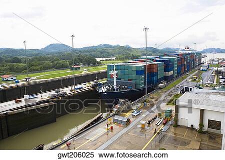 Cargo containers in a container ship at a commercial dock, Panama Canal, Panama View Large Photo Image Stock Photography - Cargo containers in a container ship at a commercial dock, Panama Canal, Panama. Fotosearch