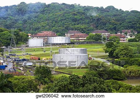 Factory on a landscape, Panama Canal, Panama View Large Photo Image Stock Image - Factory on a landscape, Panama Canal, Panama. Fotosearch