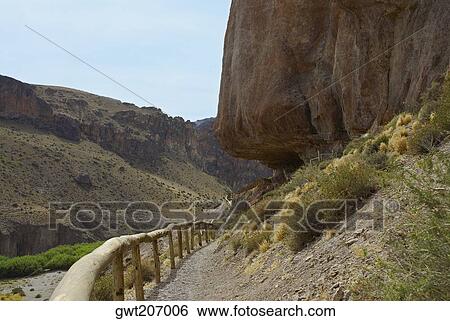 Fence in the valley, Cave of the Hands, Pinturas River, Patagonia, Argentina View Large Photo Image Stock Photograph - Fence in the valley, Cave of the Hands, Pinturas River, Patagonia, Argentina. Fotosearch