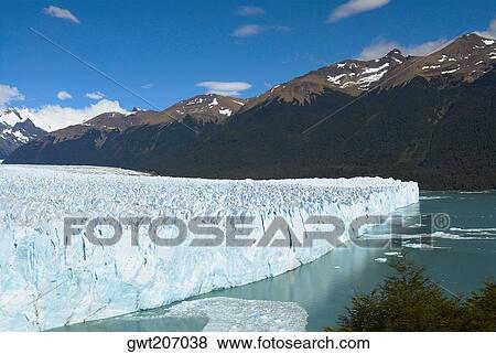 Glacier in a lake with mountains in the background, Moreno Glacier, Argentine Glaciers National Park, Lake Argentino, El Calafate, Patagonia, Argentina View Large Photo Image Stock Photo - Glacier in a lake with mountains in the background, Moreno Glacier, Argentine Glaciers National Park, Lake Argentino, El Calafate, Patagonia, Argentina. Fotosearch