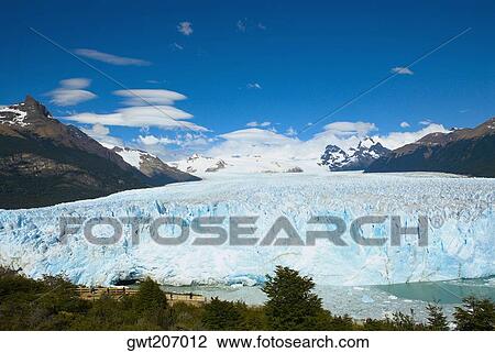 Glacier surrounded by mountains, Moreno Glacier, Argentine Glaciers National Park, Lake Argentino, El Calafate, Patagonia, Argentina View Large Photo Image Stock Image - Glacier surrounded by mountains, Moreno Glacier, Argentine Glaciers National Park, Lake Argentino, El Calafate, Patagonia, Argentina. Fotosearch