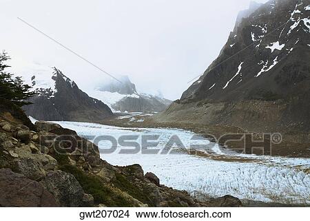Glacier surrounded by mountains, Glacier Grande, Mt Fitzroy, Chalten, Southern Patagonian Ice Field, Patagonia, Argentina View Large Photo Image Picture - Glacier surrounded by mountains, Glacier Grande, Mt Fitzroy, Chalten, Southern Patagonian Ice Field, Patagonia, Argentina. Fotosearch