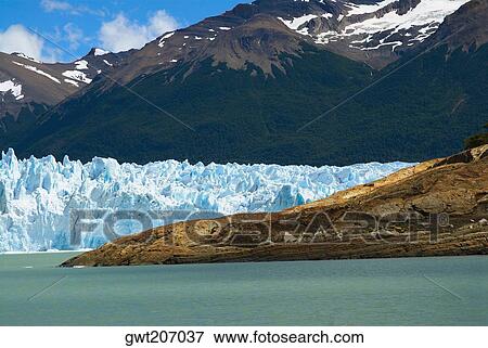 Glaciers in front of mountains, Moreno Glacier, Argentine Glaciers National Park, Lake Argentino, El Calafate, Patagonia, Argentina View Large Photo Image Stock Photo - Glaciers in front of mountains, Moreno Glacier, Argentine Glaciers National Park, Lake Argentino, El Calafate, Patagonia, Argentina. Fotosearch